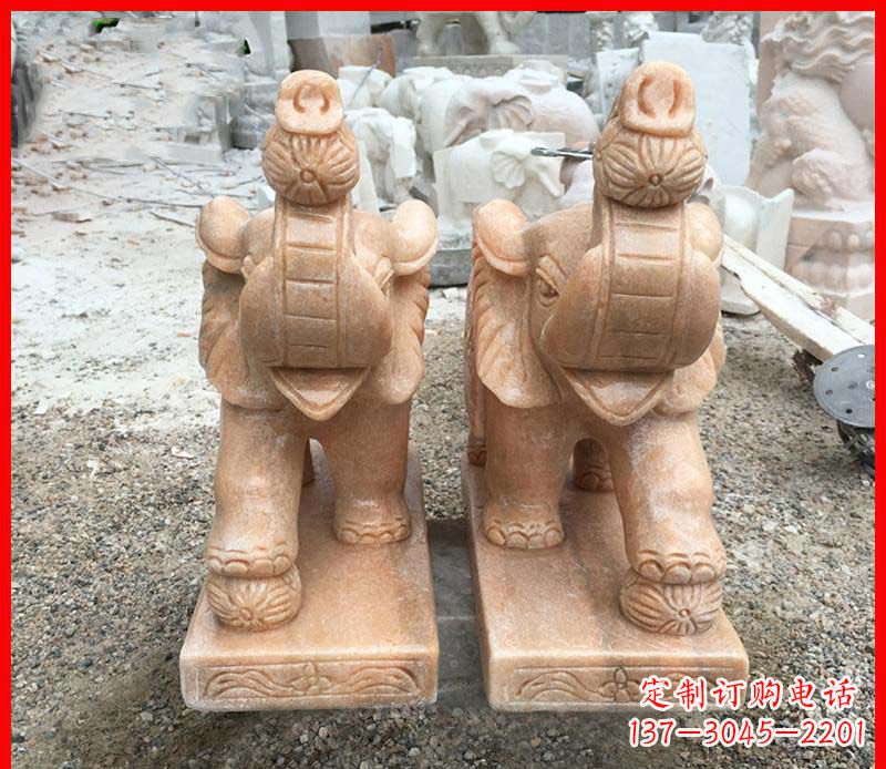 张掖鼻卷绣球的小象石雕
