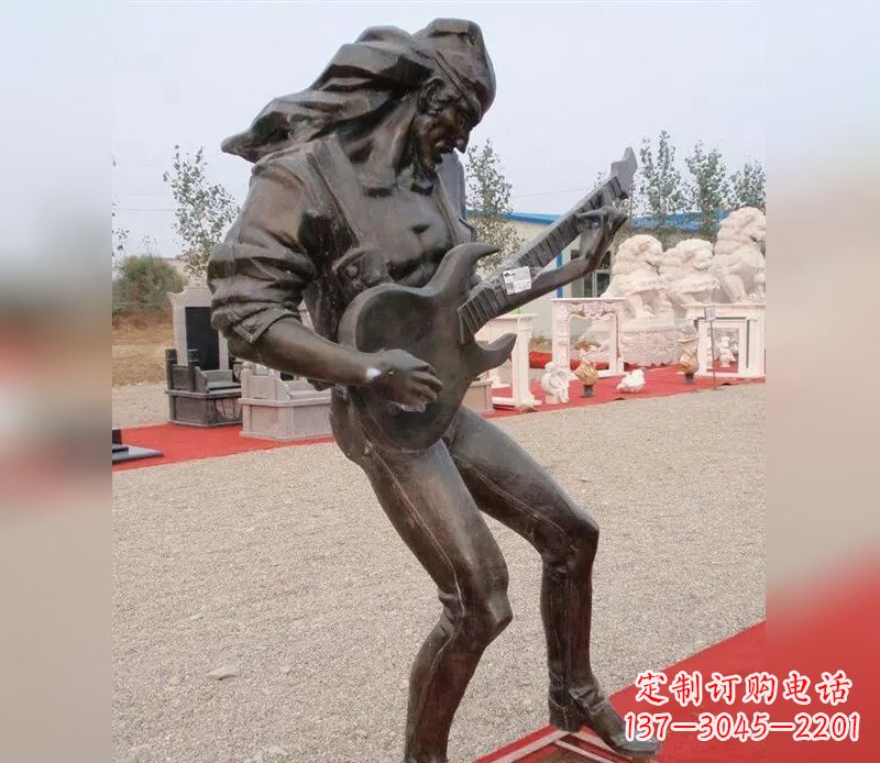 张掖弹吉他广场小品人物铜雕