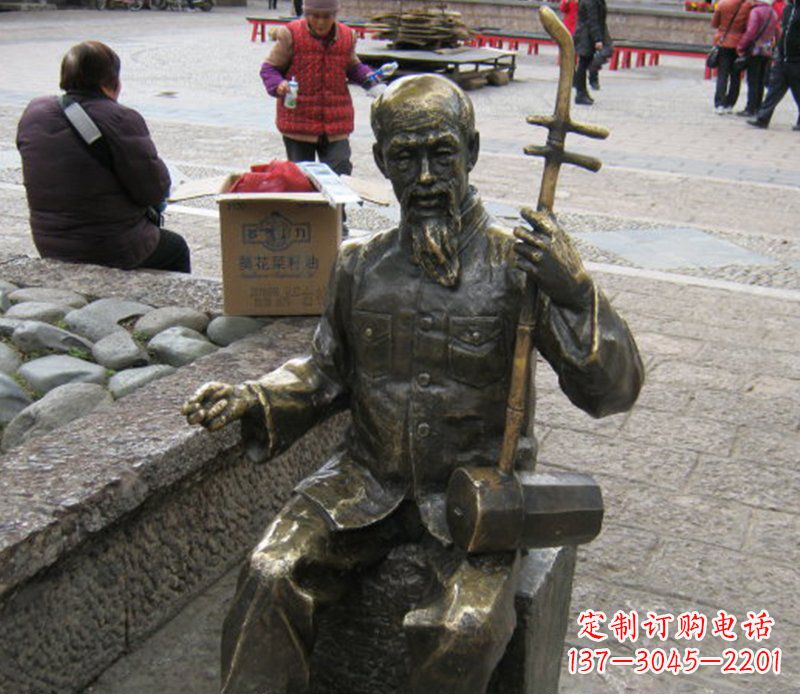 张掖精美绝伦的「老人拉二胡铜雕」