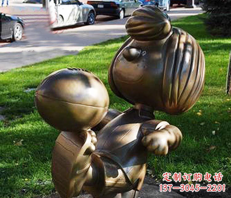 张掖踢球的小女孩铜雕