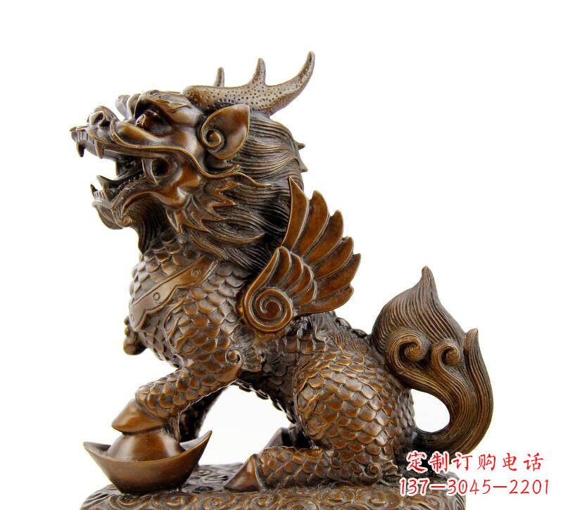 张掖铜雕踩元宝麒麟