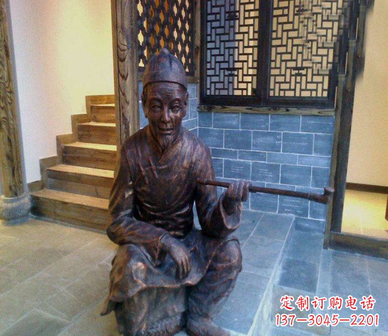 张掖铜雕店小二吸烟庭院人物雕塑
