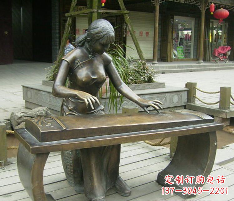 张掖铜雕现代人物弹古筝雕塑