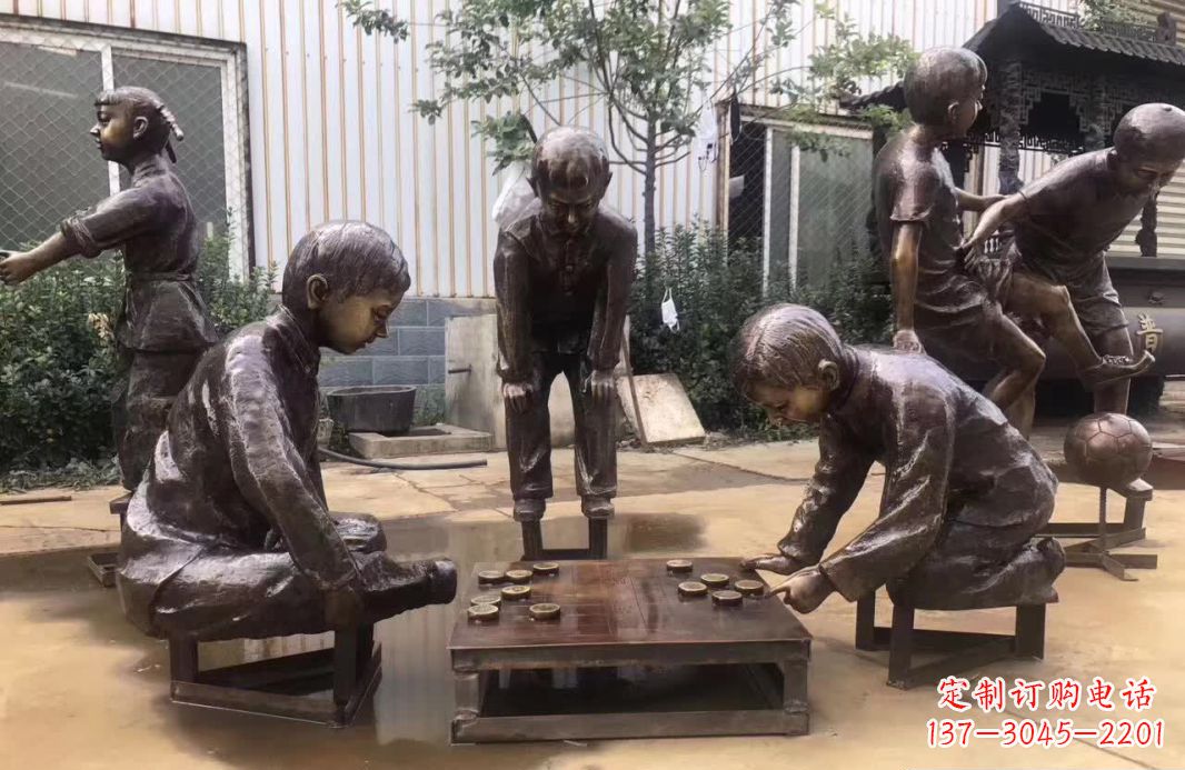 张掖下象棋儿童铜雕