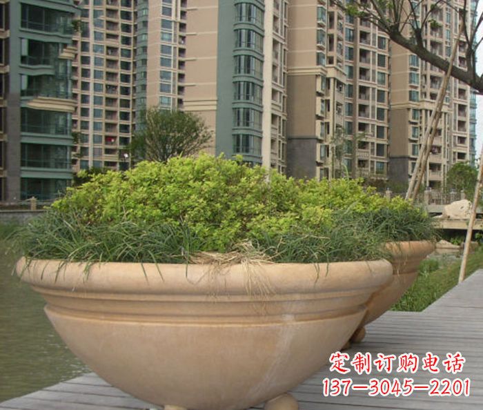 张掖小区景观晚霞红花盆石雕