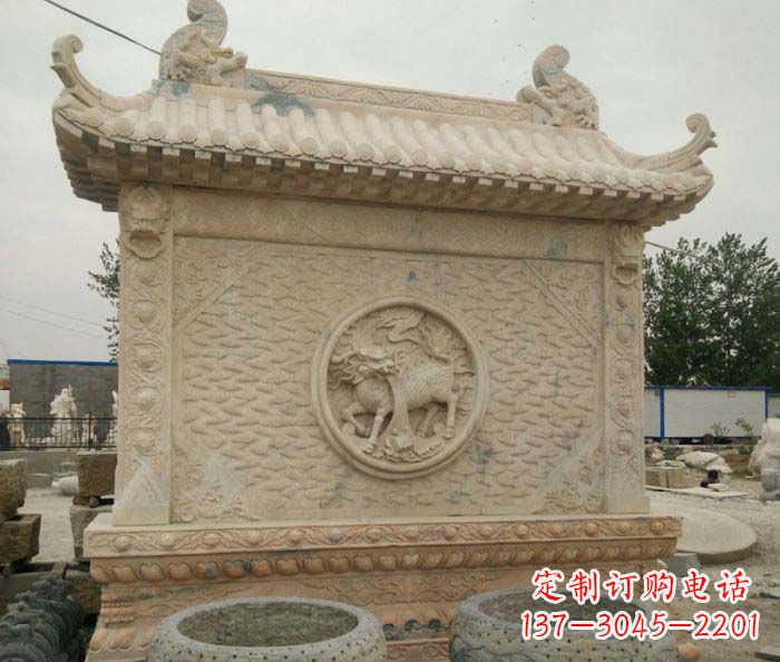 张掖园林景观晚霞红石雕影壁